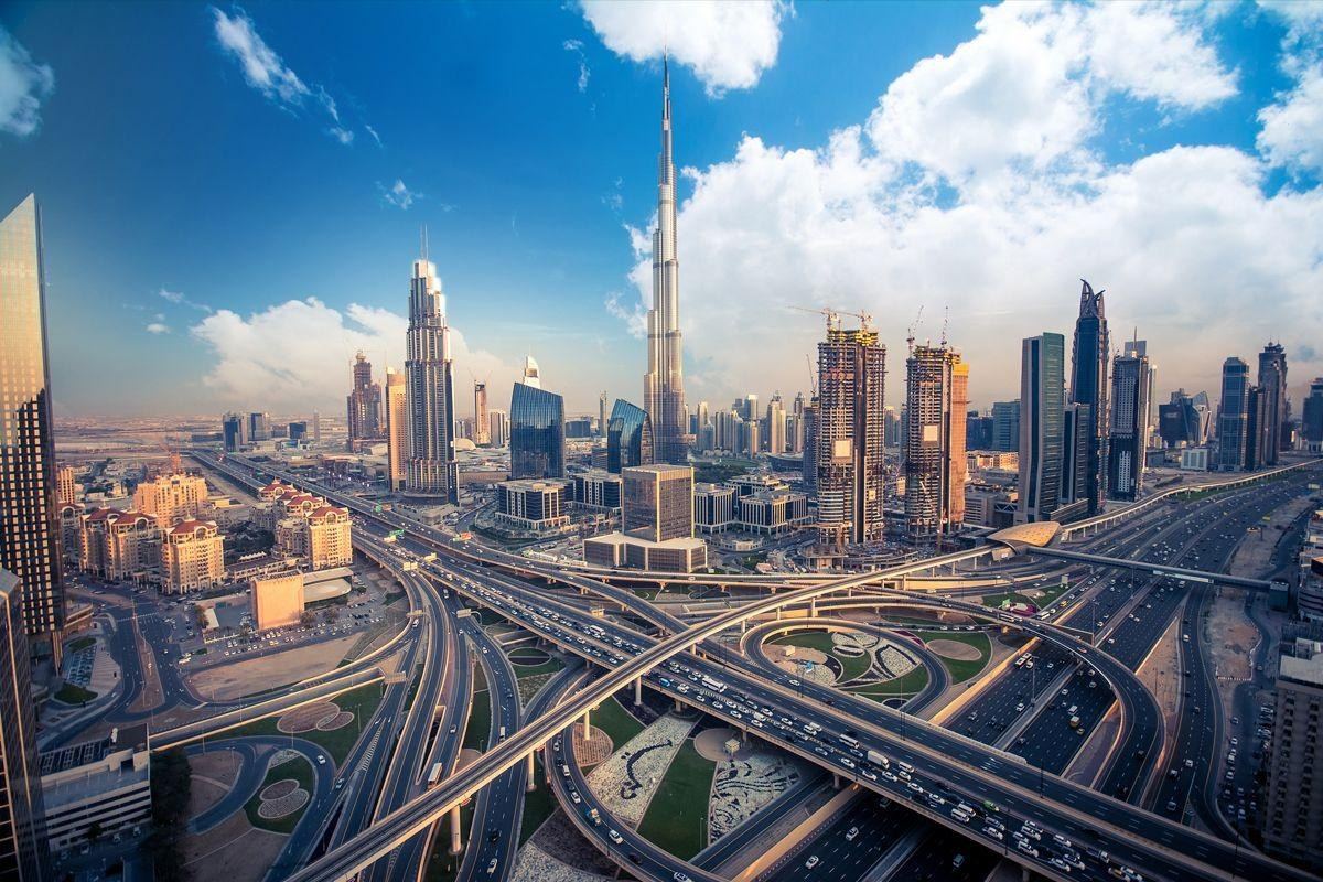 Dubai skyline above a highway interchange