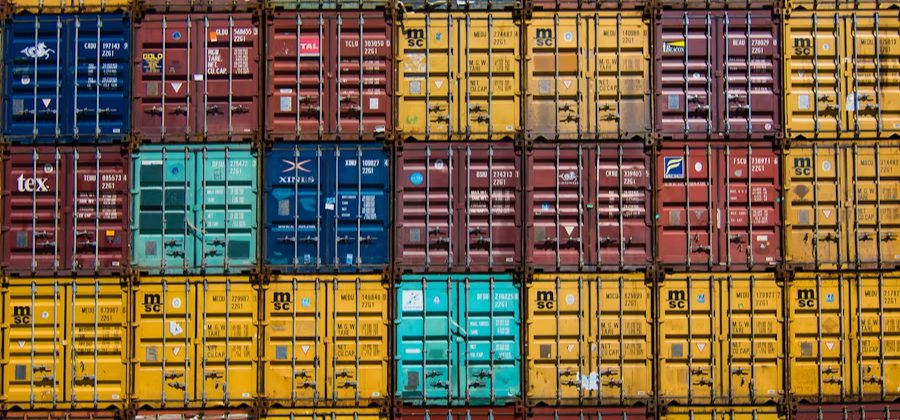 Stacked shipping containers forming a grid of records